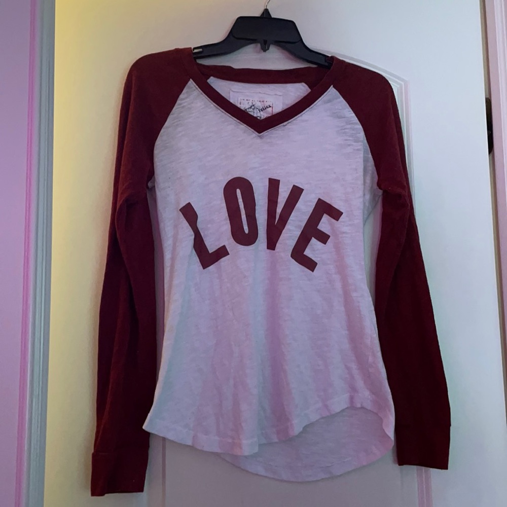 Women’s white and red long sleeved shirt